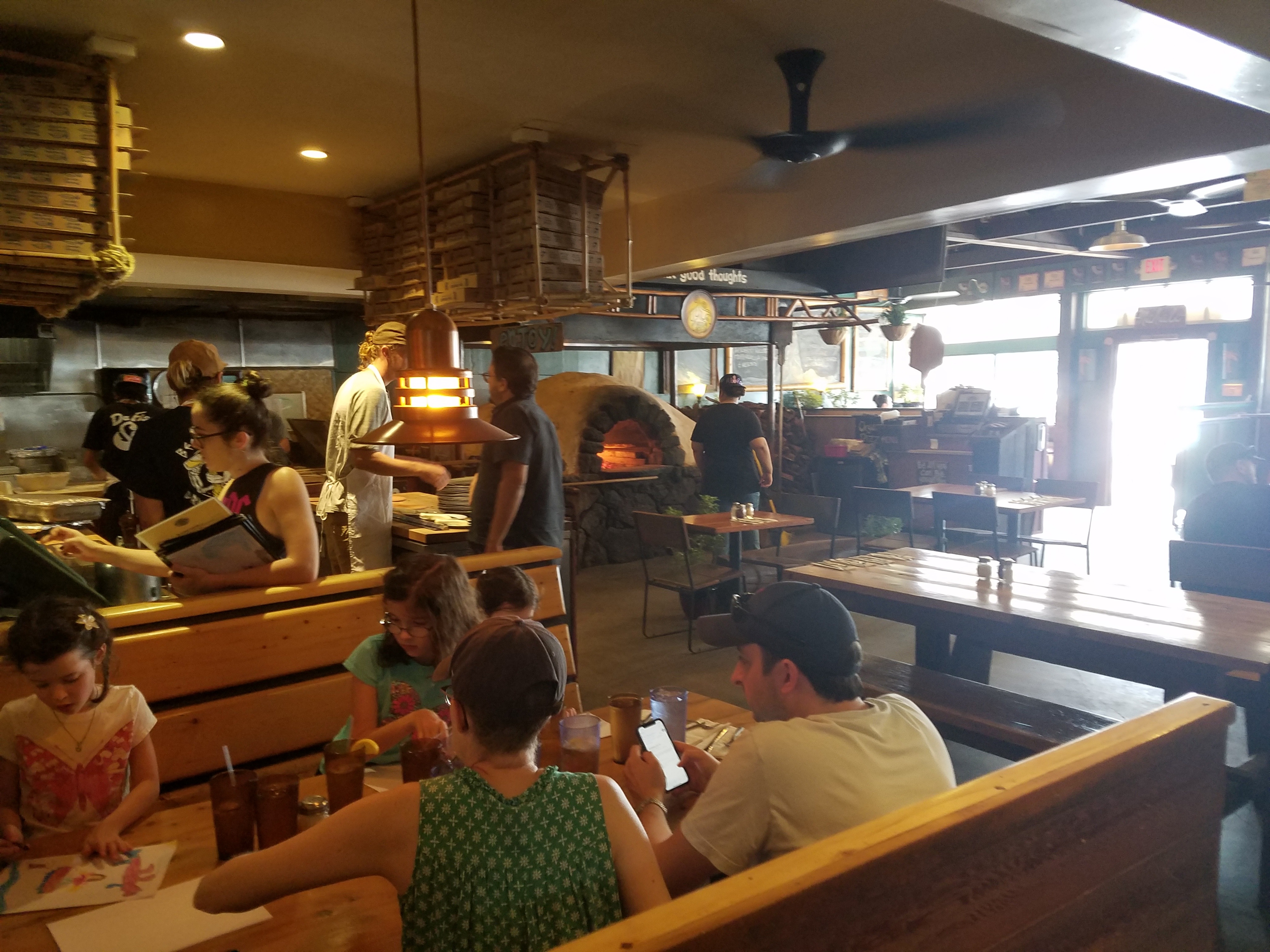 Family eating at Flatbread Paia