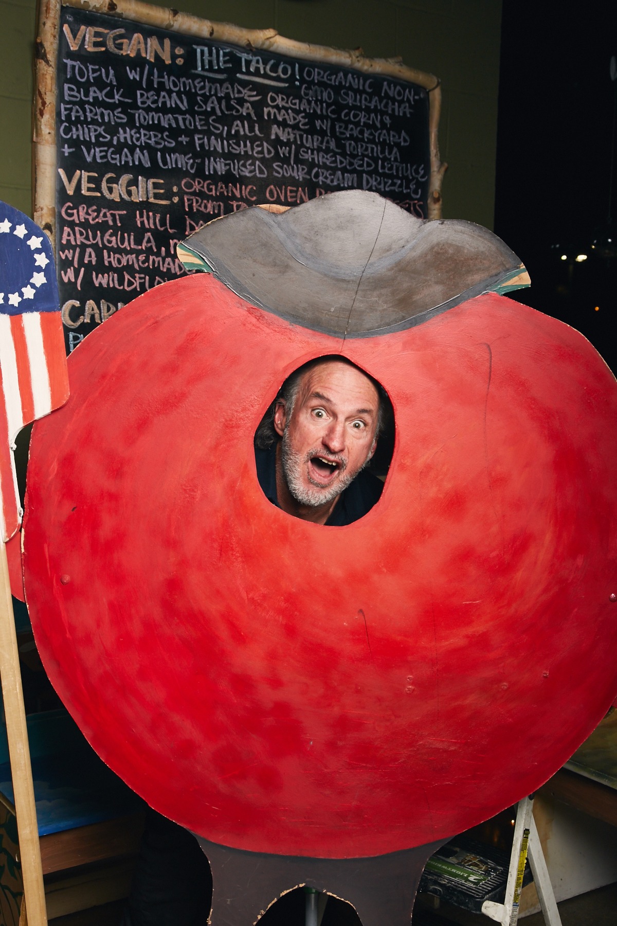 Founder Jay making a funny face in a tomato