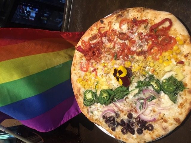 image of pizza with rainbow veggies