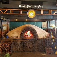 Image of the earth oven at Paia
